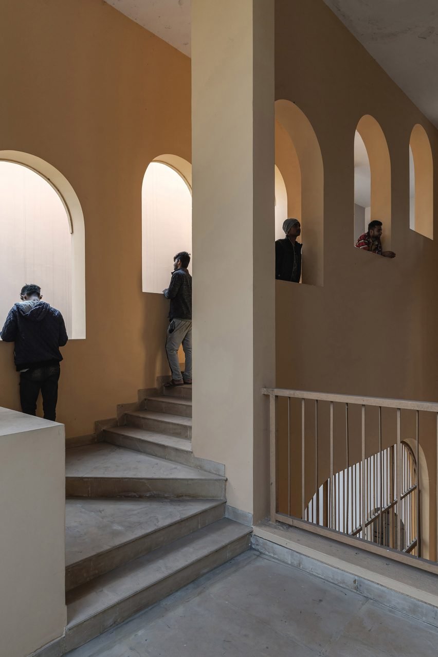 Staircase in the community center by Abin Design Studio