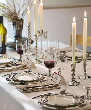 Chrome silver Christmas tablescape with bow decor