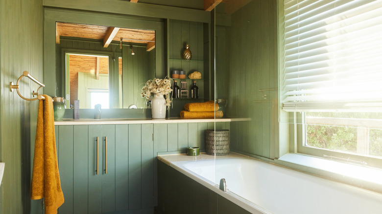 Wood and sage green style bathroom design