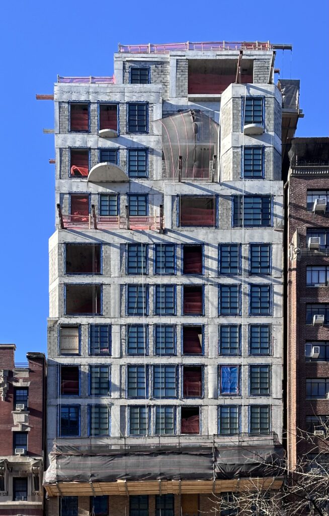 Facade installation underway at 16 Fifth Avenue in Greenwich Village, Manhattan