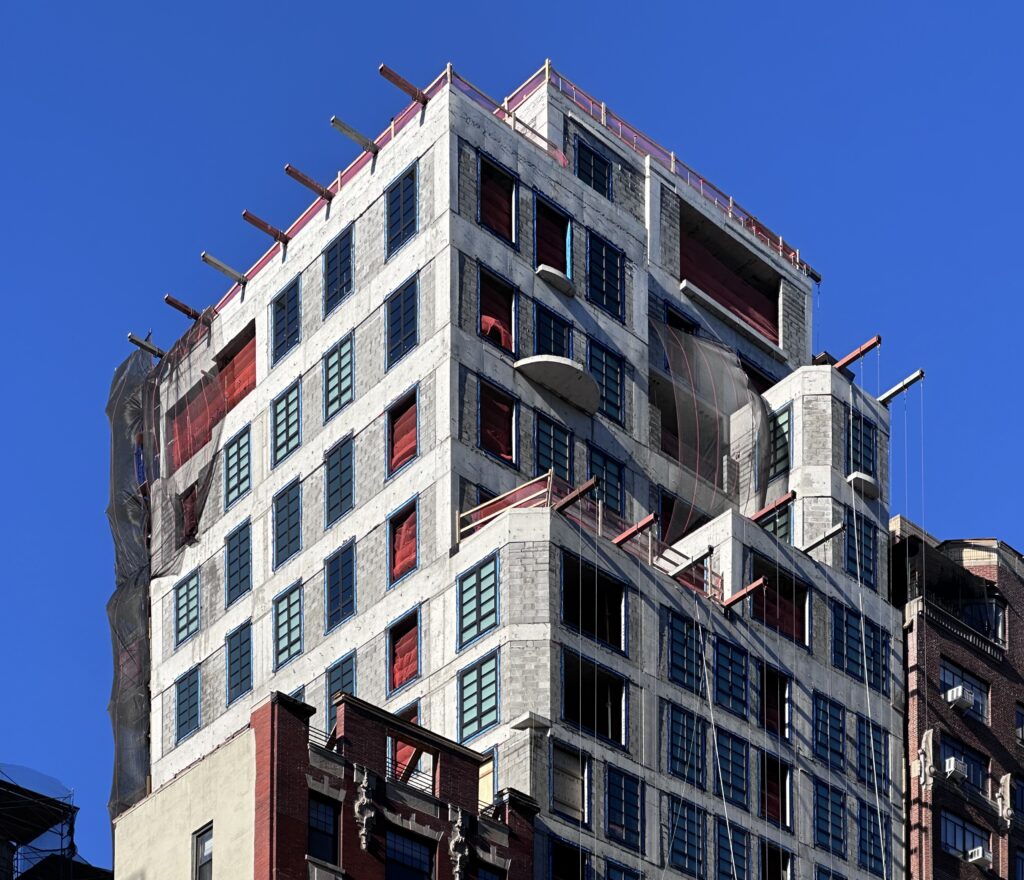 Facade installation underway at 16 Fifth Avenue in Greenwich Village, Manhattan