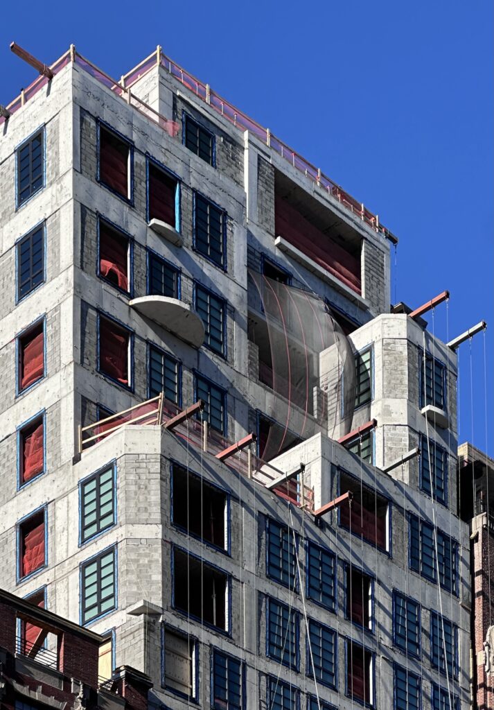 Facade installation underway at 16 Fifth Avenue in Greenwich Village, Manhattan