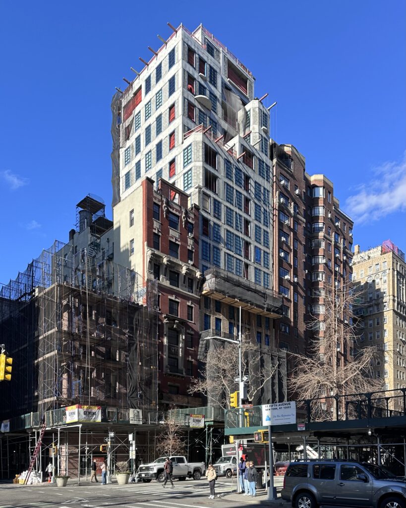 Facade installation underway at 16 Fifth Avenue in Greenwich Village, Manhattan