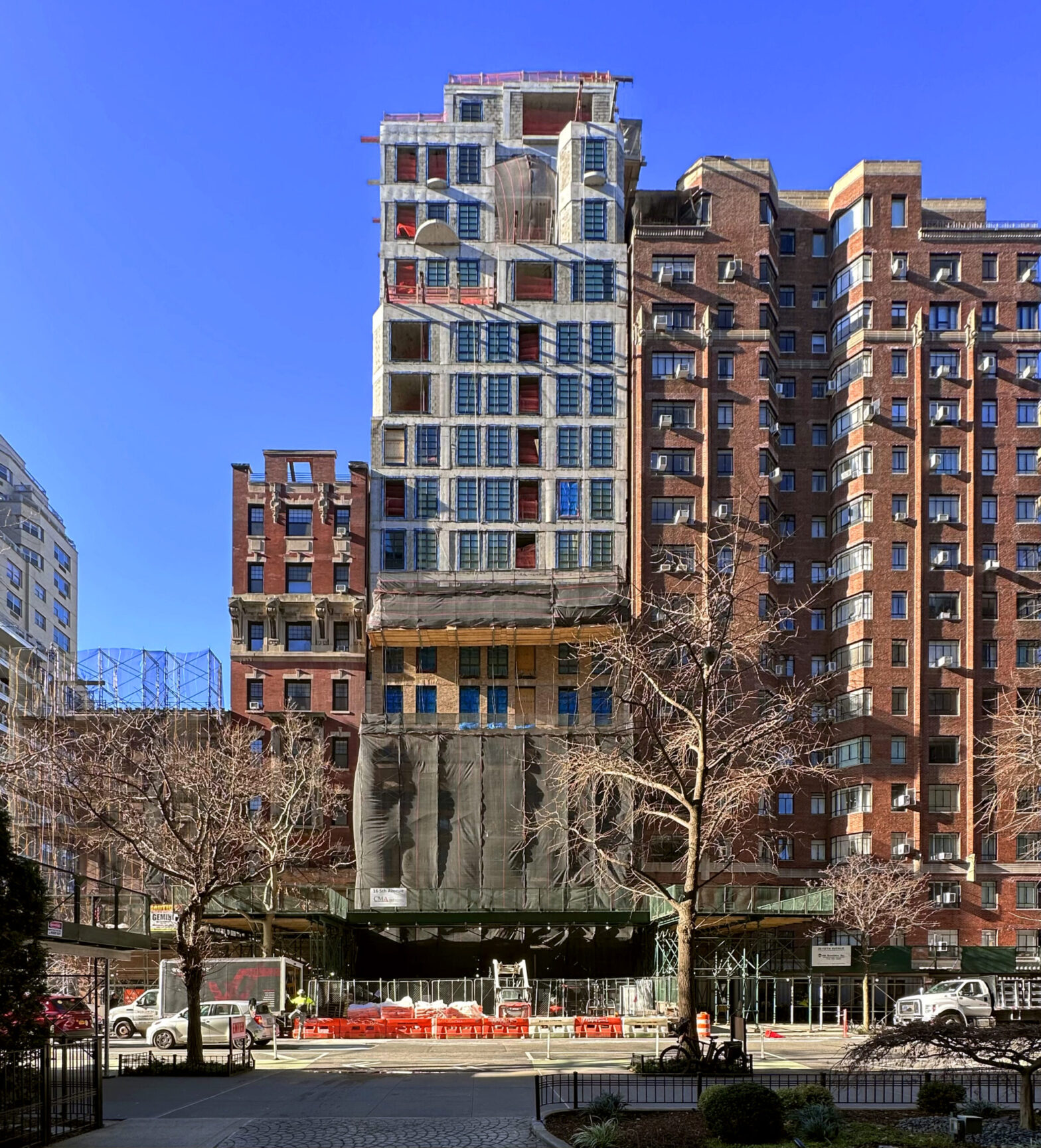 Facade installation underway at 16 Fifth Avenue in Greenwich Village, Manhattan