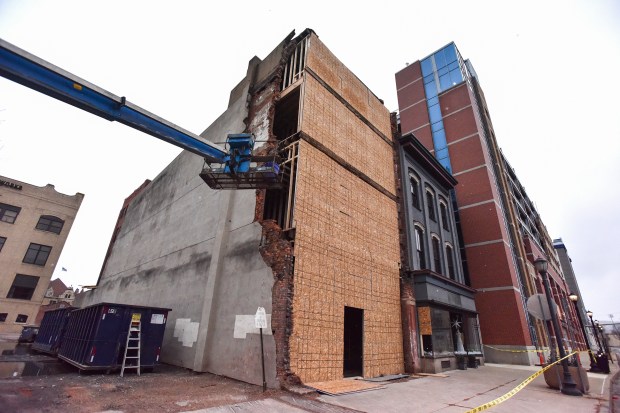 A crew member works at the former Coney Island Lunch...