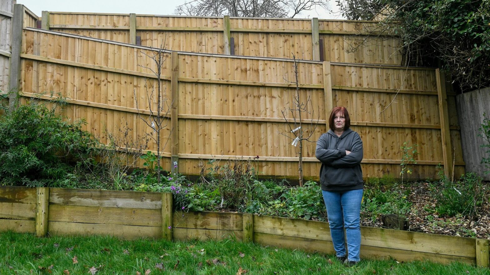 Our neighbor's 10 foot privacy fence towers over our yard...it's like living next to a highway or a prison camp