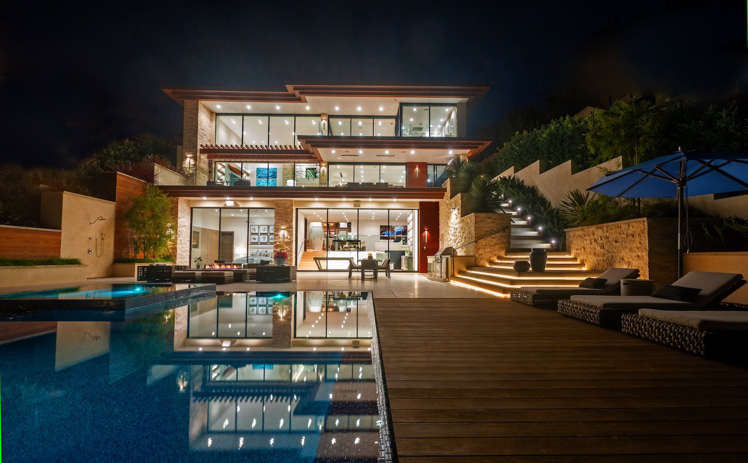 Exterior view of the luxurious Del Mar home owned by Kerry and Corrine Marsh with pool, hot tub and three-story outdoor patio