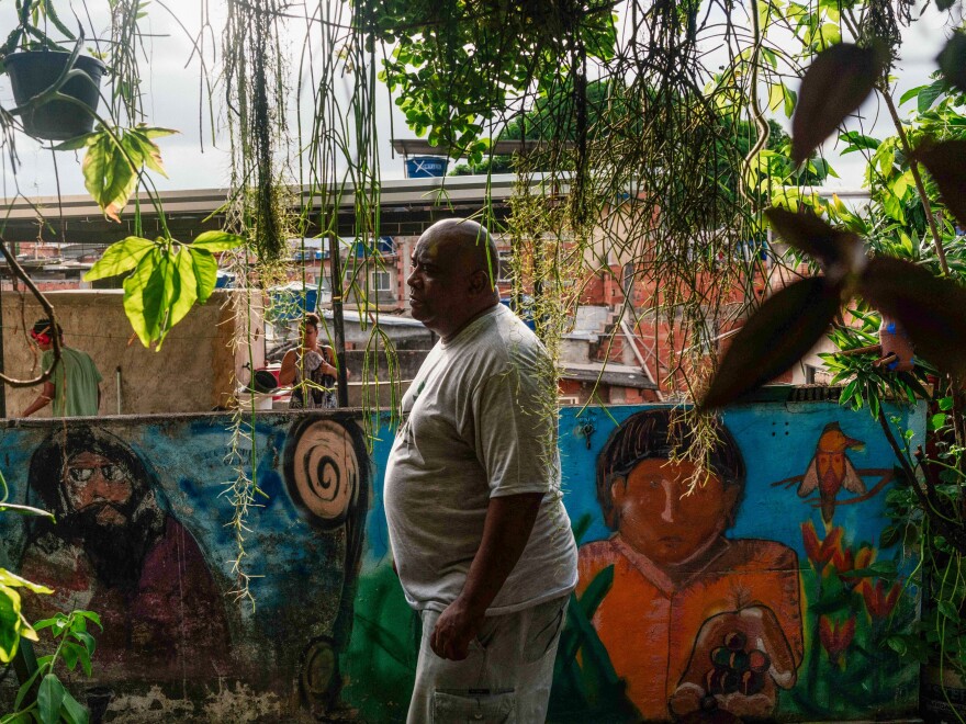 Luis Cassiano in front of his house with a green roof in Rio de Janeiro. He is the founder of a nonprofit group that advocates for green roofs.