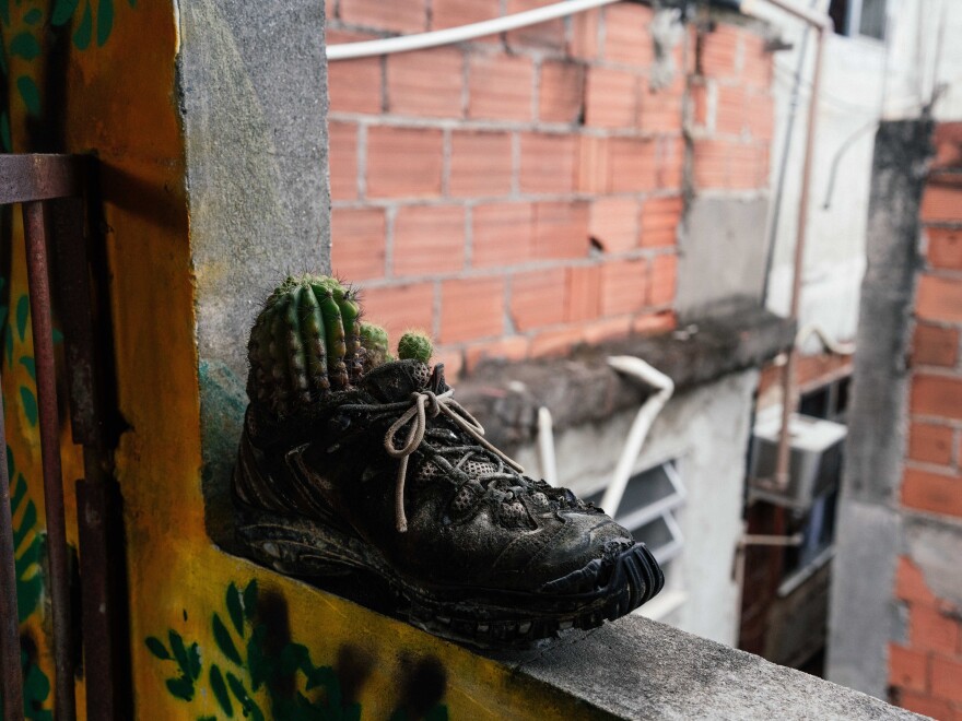 There is a lot of green in the favelas - on roofs and... even in shoes.