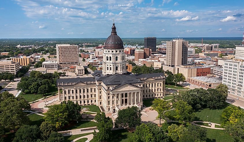 Afternoon view of the historic State Capitol building in the city center of Topeka, Kansas.