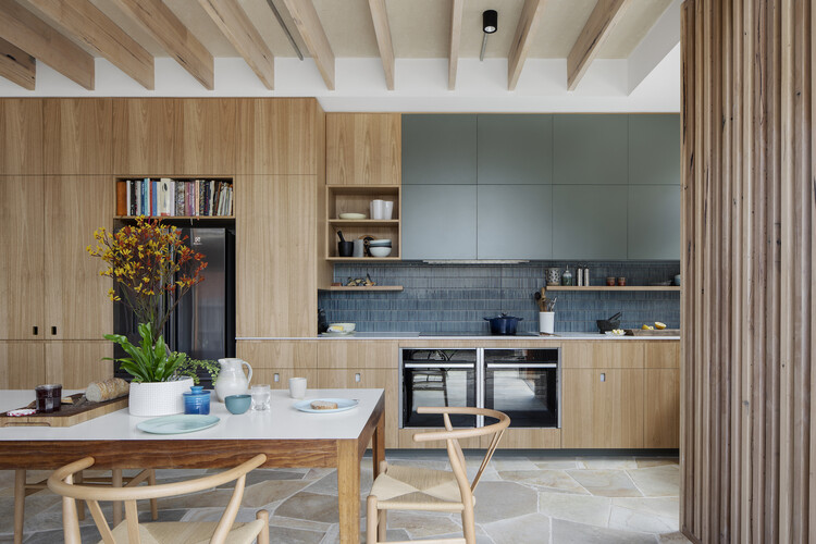 Life cycle house / Steffen Welsch Architects - interior photography, kitchen, wood, worktop, table, lighting, chair, shelves, shelves