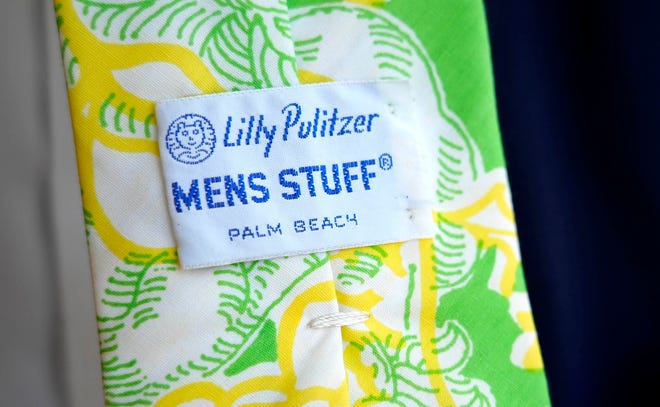 Ted Cooney shows his vintage Lilly Pulitzer label during the first event of men on February 19 in Palm Beach. On February 23, Lilly Pulitzer will bring the revived men's collection, Men Stuff, onto the market.