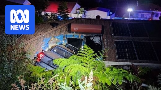 The driver supposedly rejects a breath test after the car falls home on the roof of Port Macquarie