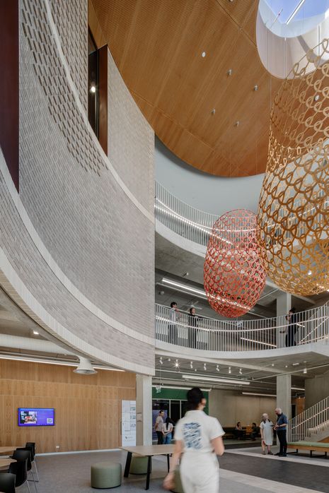 The three -story entry foyer contains a sculpture by the artists of the first Nations Aunt Kim Wandin and Christine Joy.