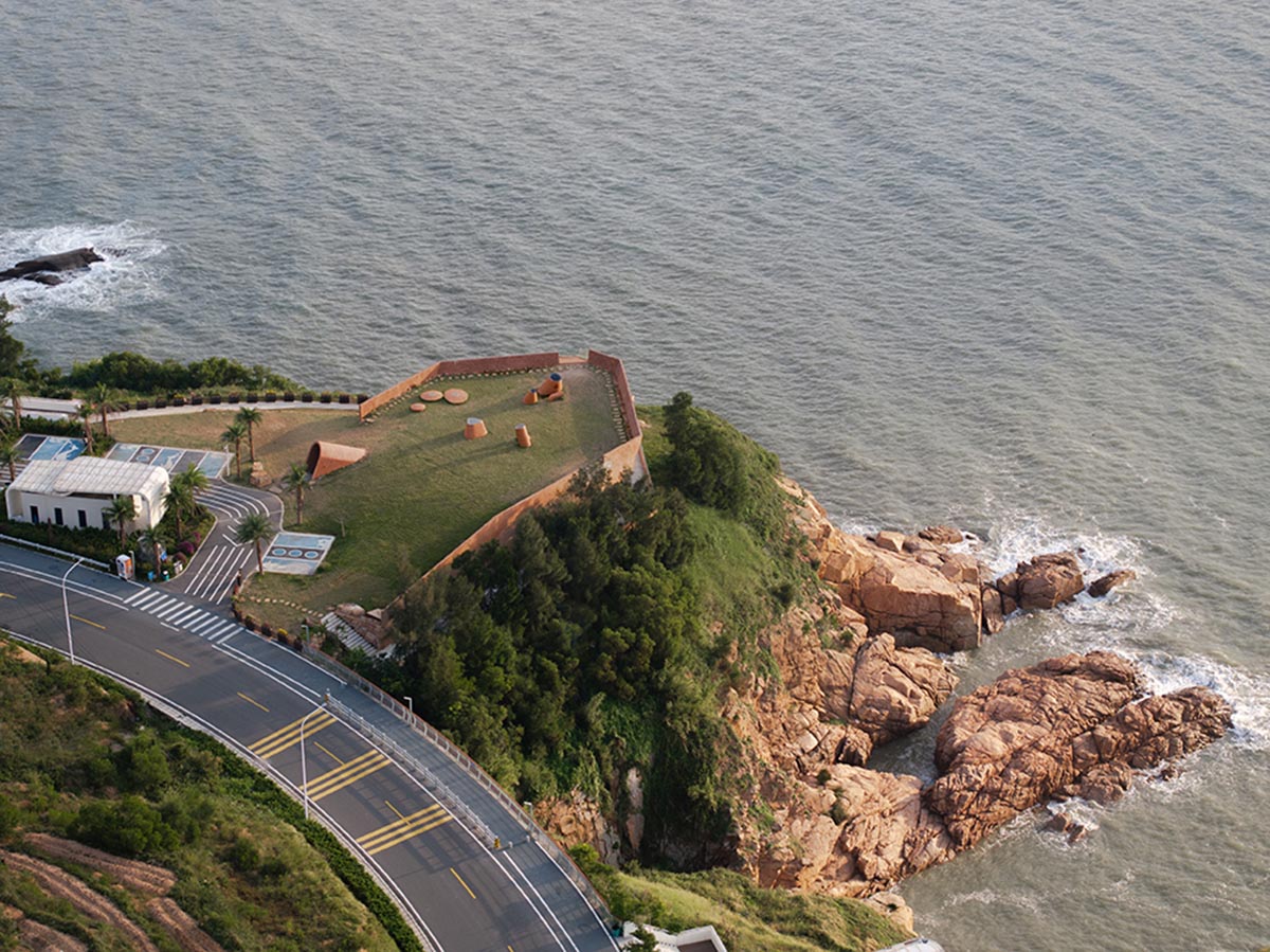 A gallery on a cliff has irregularly shaped lighting pipes that imitate creatures in China Marine