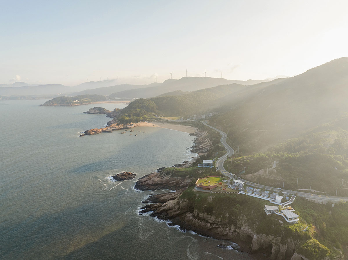 A gallery on a cliff has irregularly shaped lighting pipes that imitate creatures in China Marine