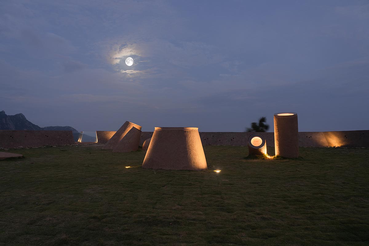 A gallery on a cliff has irregularly shaped lighting pipes that imitate creatures in China Marine