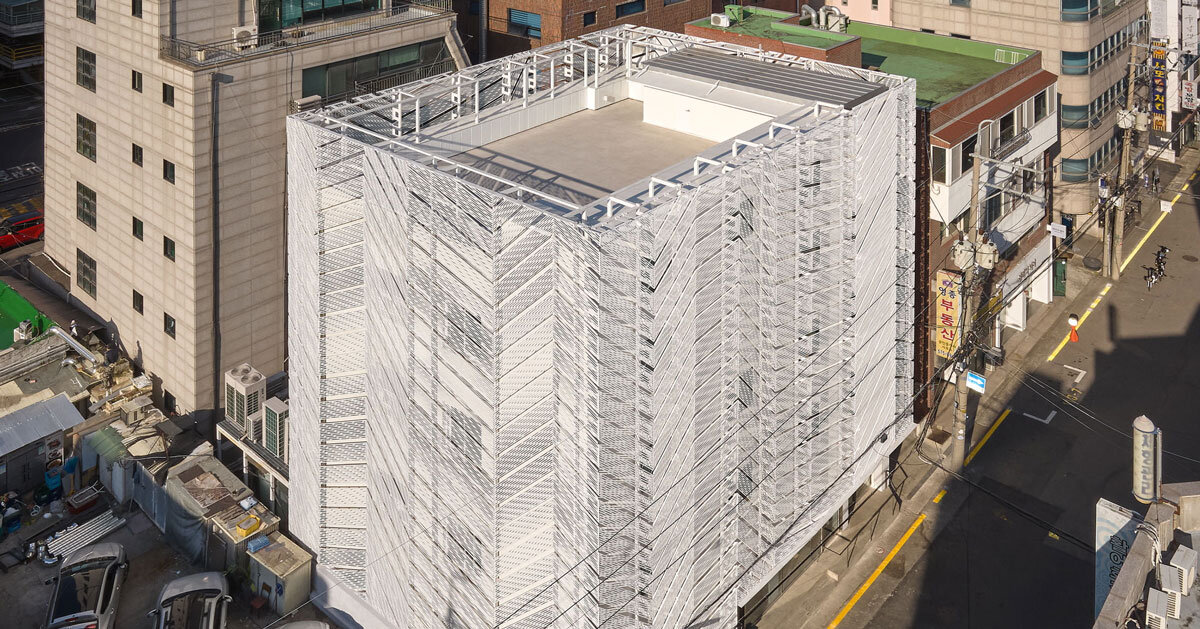 Perforated metal panels upgrade the outside of the building in responsive facade in Seoul