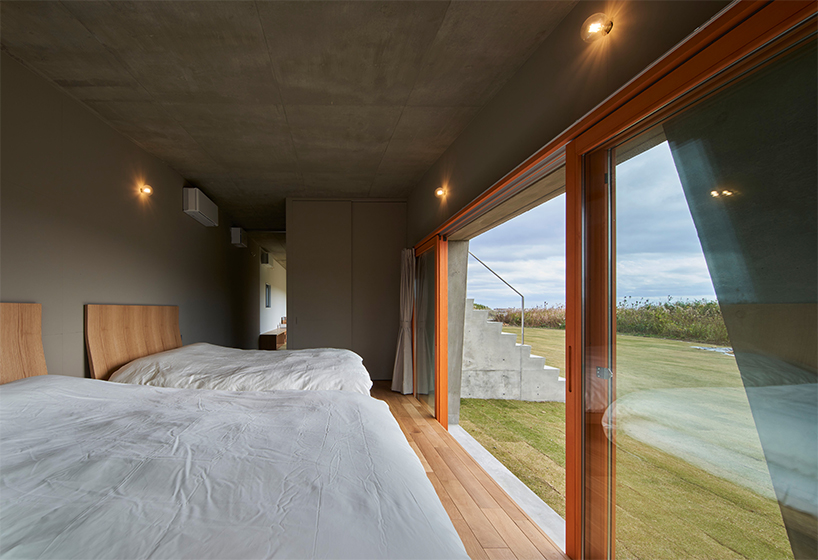 Beton Isumi Villa by Takeshi Hosaka Architects spread organically over land in Japan