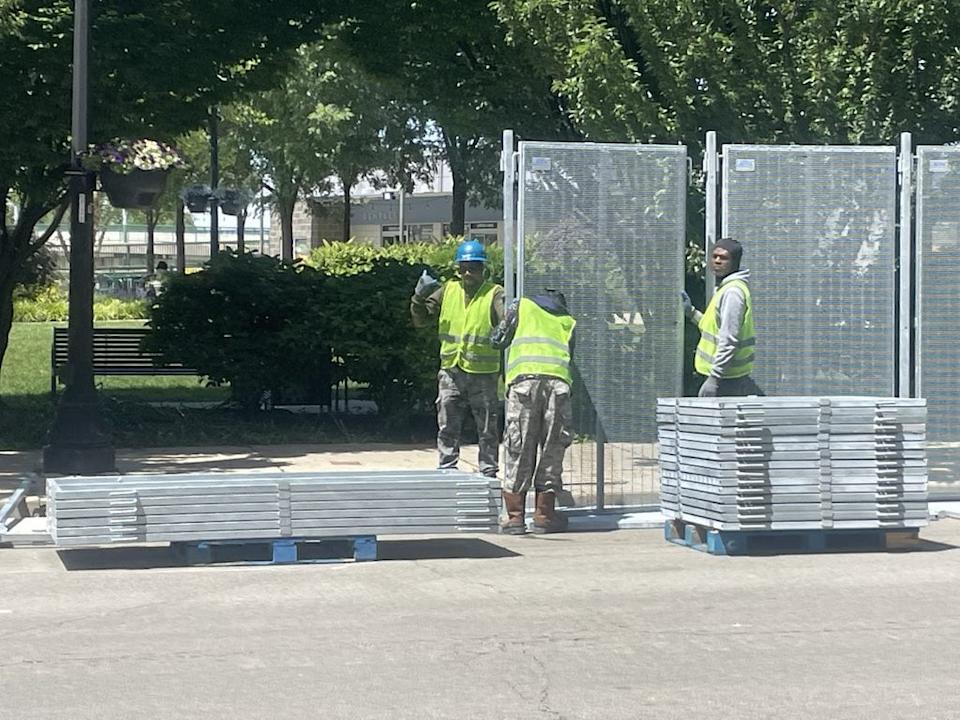 Fences, barricades around the NATO village, the coming down
