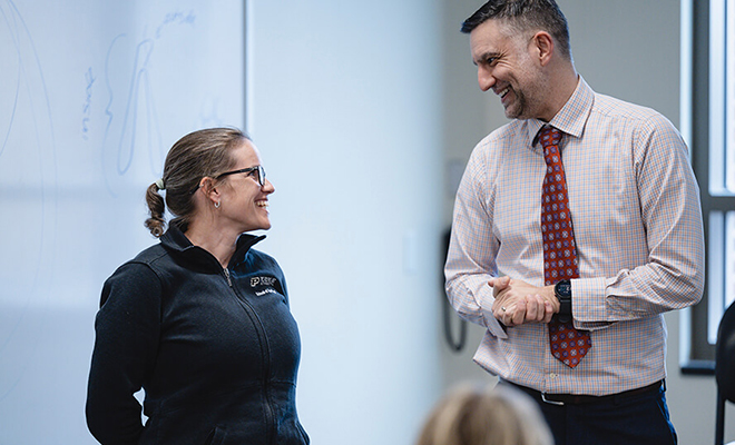 Purdue Nursing Professor Rebecca Johnson is in her classroom and receives a teaching price.