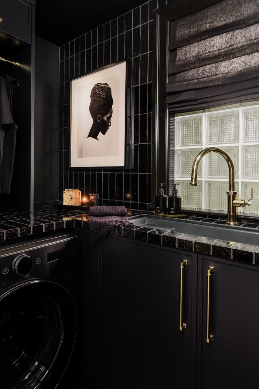 Modern washroom with sink and decorative elements Modern washroom with sink and decorative elements