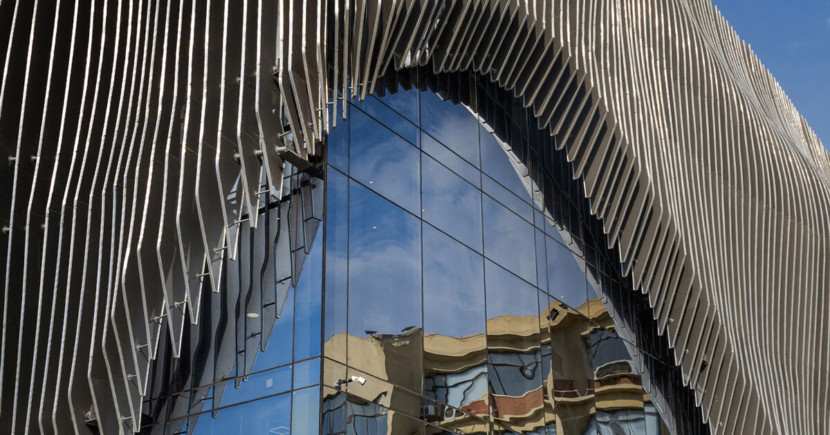 Wave -like aluminum curtain facade via the Ain Shams University Theater in Egypt