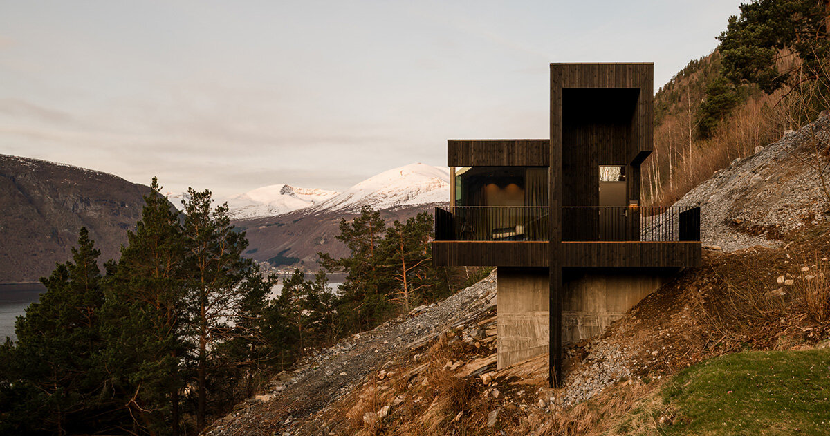 A holiday home in Valldal from Office Inainn reacts to the dramatic terrain of Norway