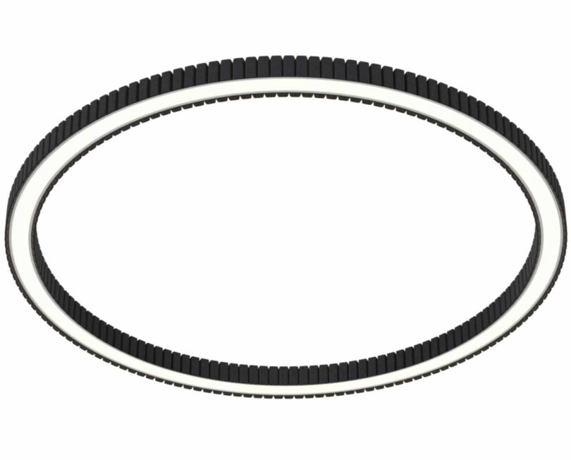 A black, circular, ridden ring with a white inner edge is displayed in front of a white background.