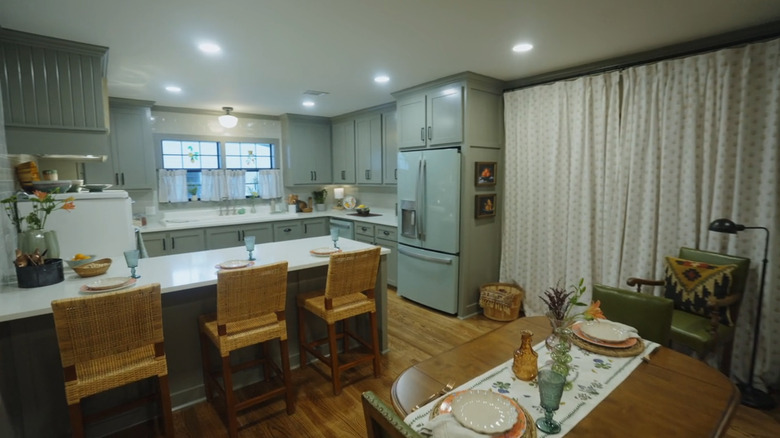 Kitchen with vinyl packed fridge