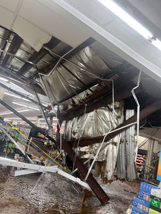 Accumulated rainwater causes a collapse of roof at Madison Woodman's