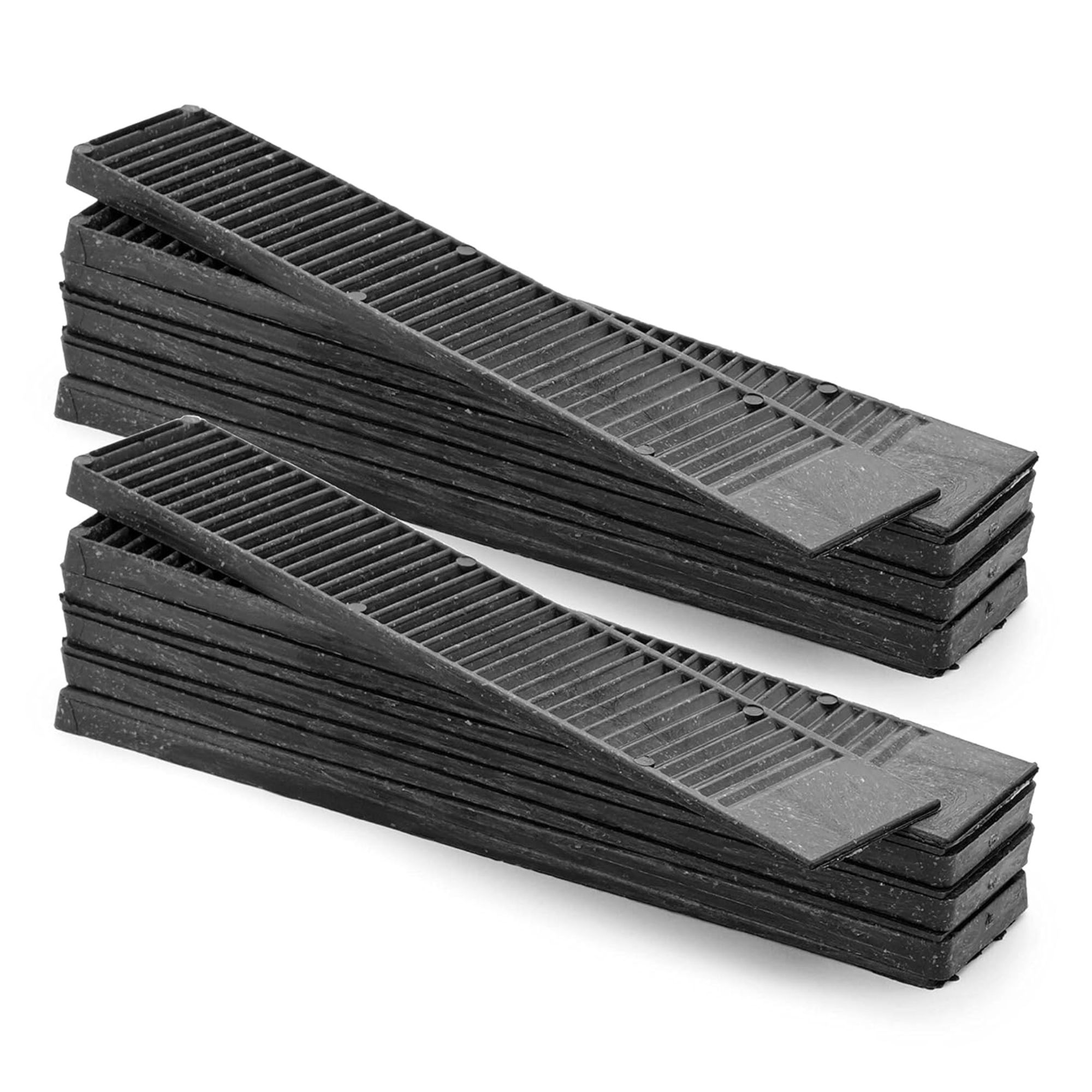 Two stacks of black wedges 