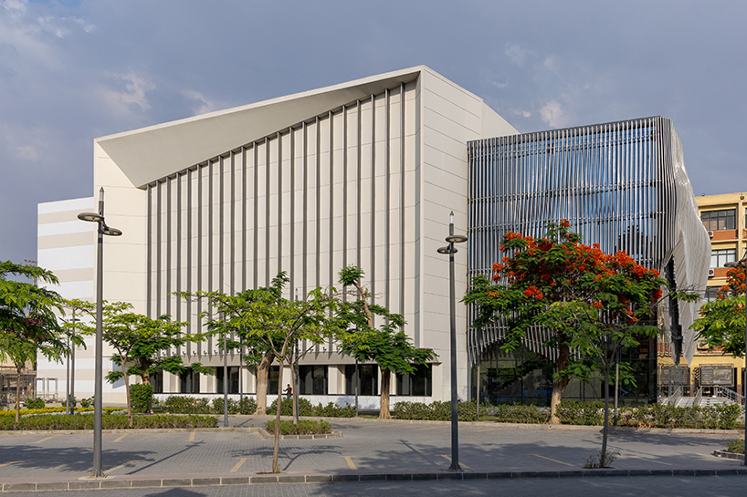 Wave -like aluminum curtain facade via the Ain Shams University Theater in Egypt
