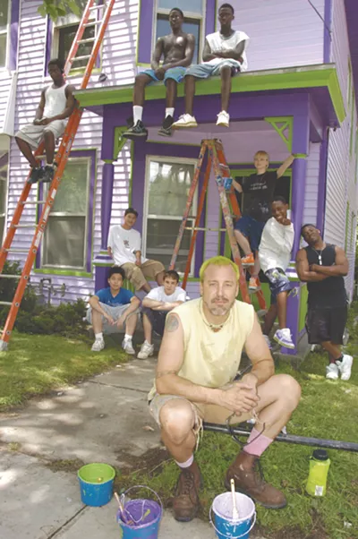 Stu McGowan and his crew work in a house in 2005 - File: Matthew Thorsen
