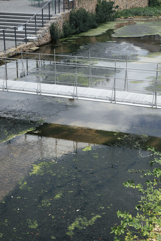 Short -lived bridge / far workshop - external photography, bank promenade
