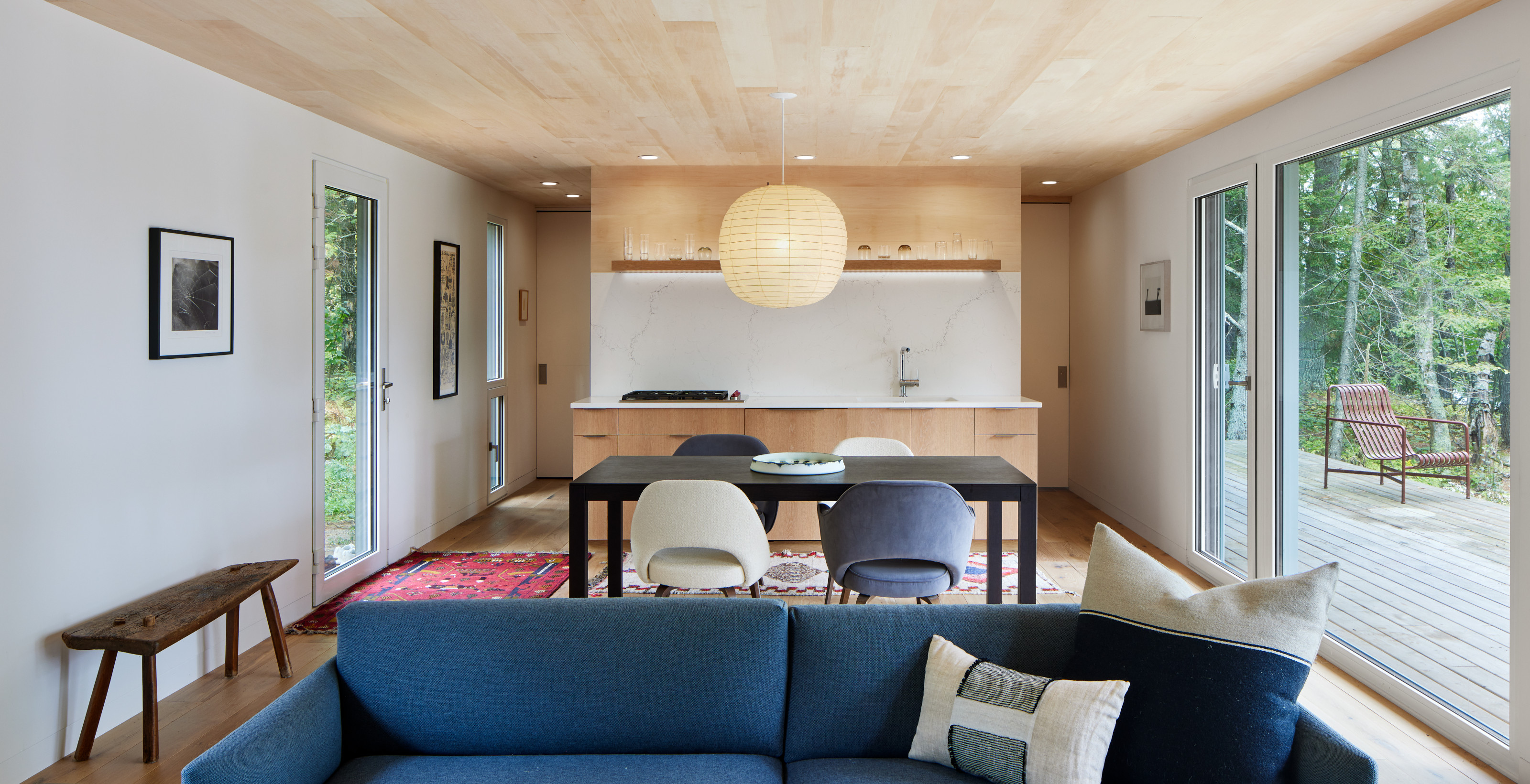The narrow plan enables the light into the heart of the cabin