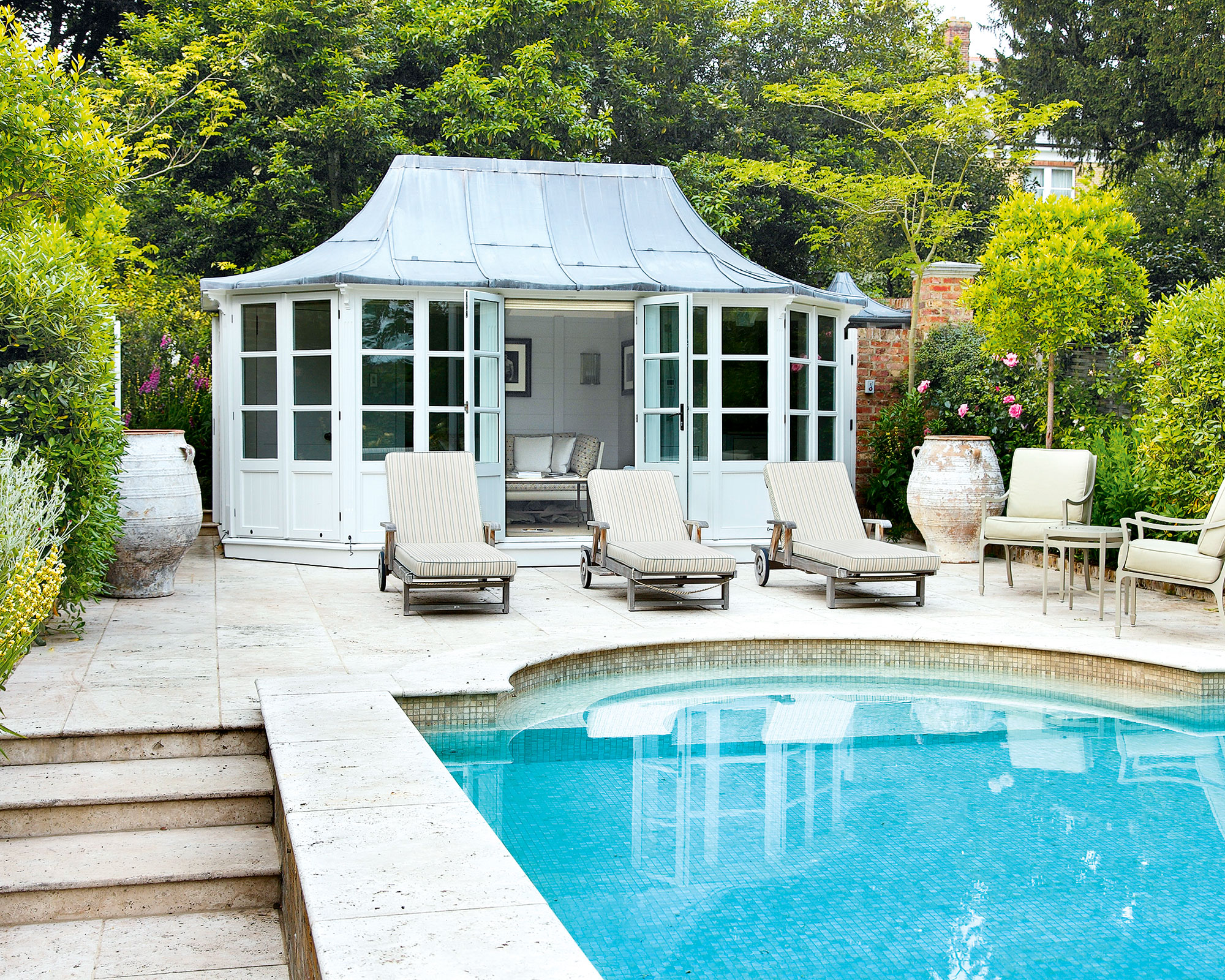Pool ideas with a classic pool house retreat