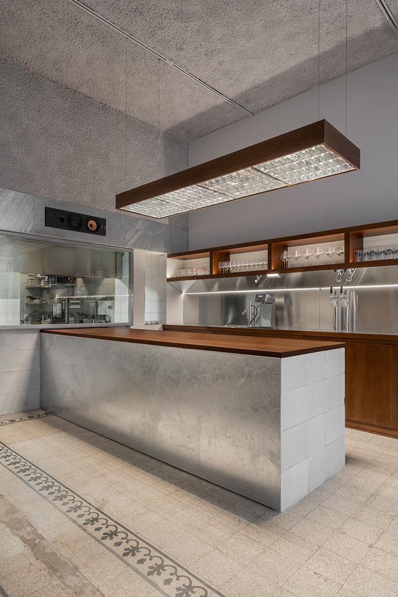In this Milan wine bar, Studiomille creates a cozy meeting room that is rooted in Filipino culture