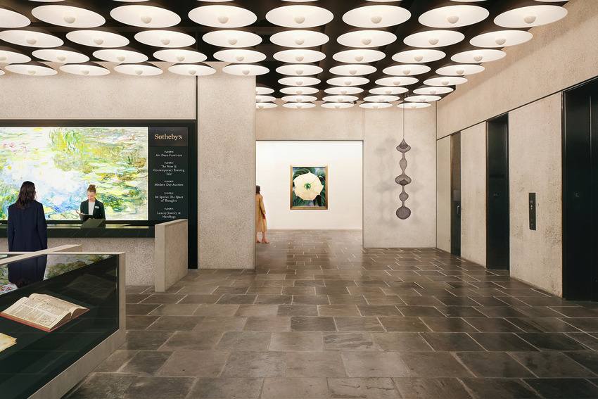 Art gallery interior with visitors, illuminated works of art exhibited and modern design elements such as stone floors and ceiling lights.