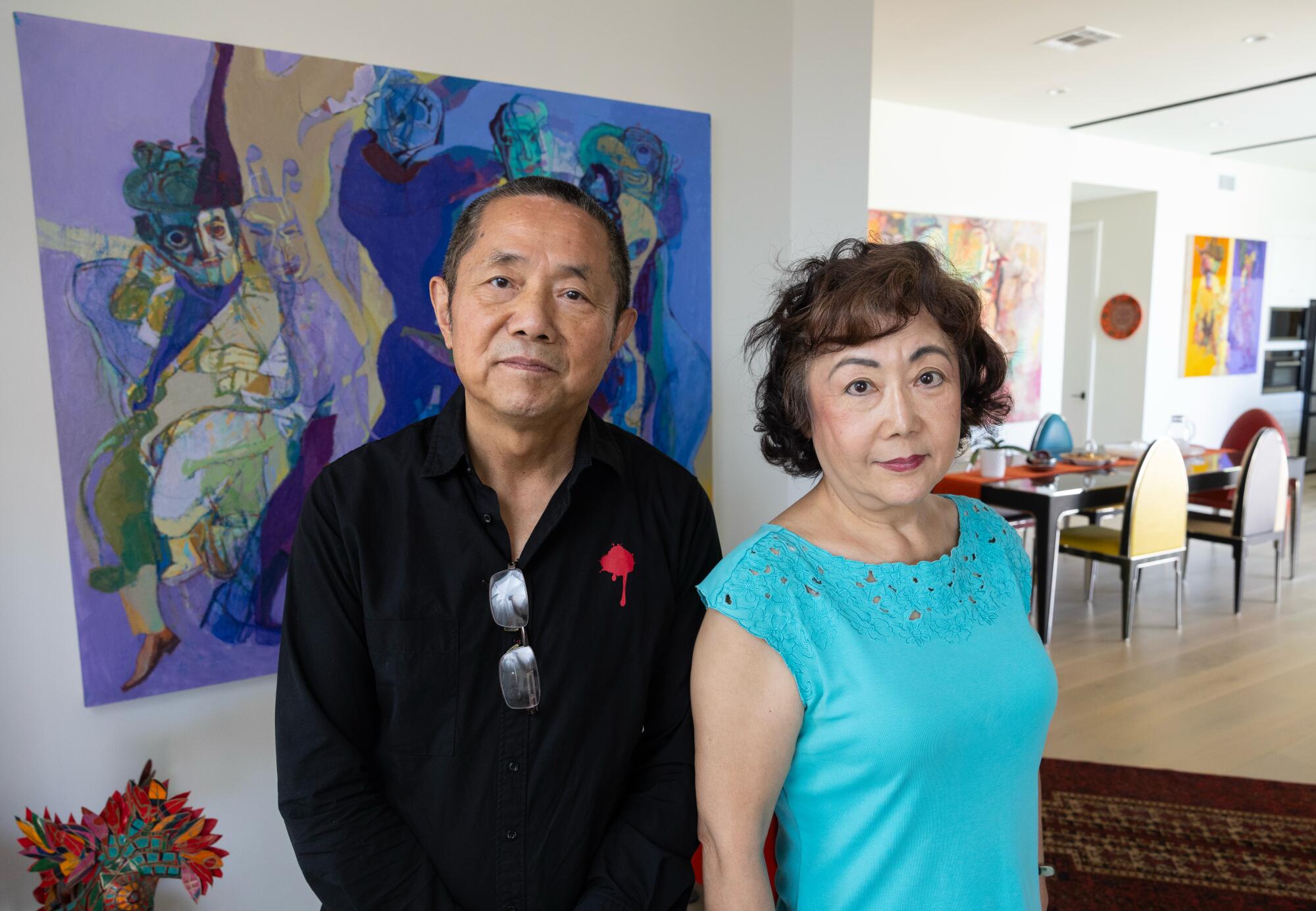The Los Angeles artist Yi Kai and his wife Zheng Jian at home.
