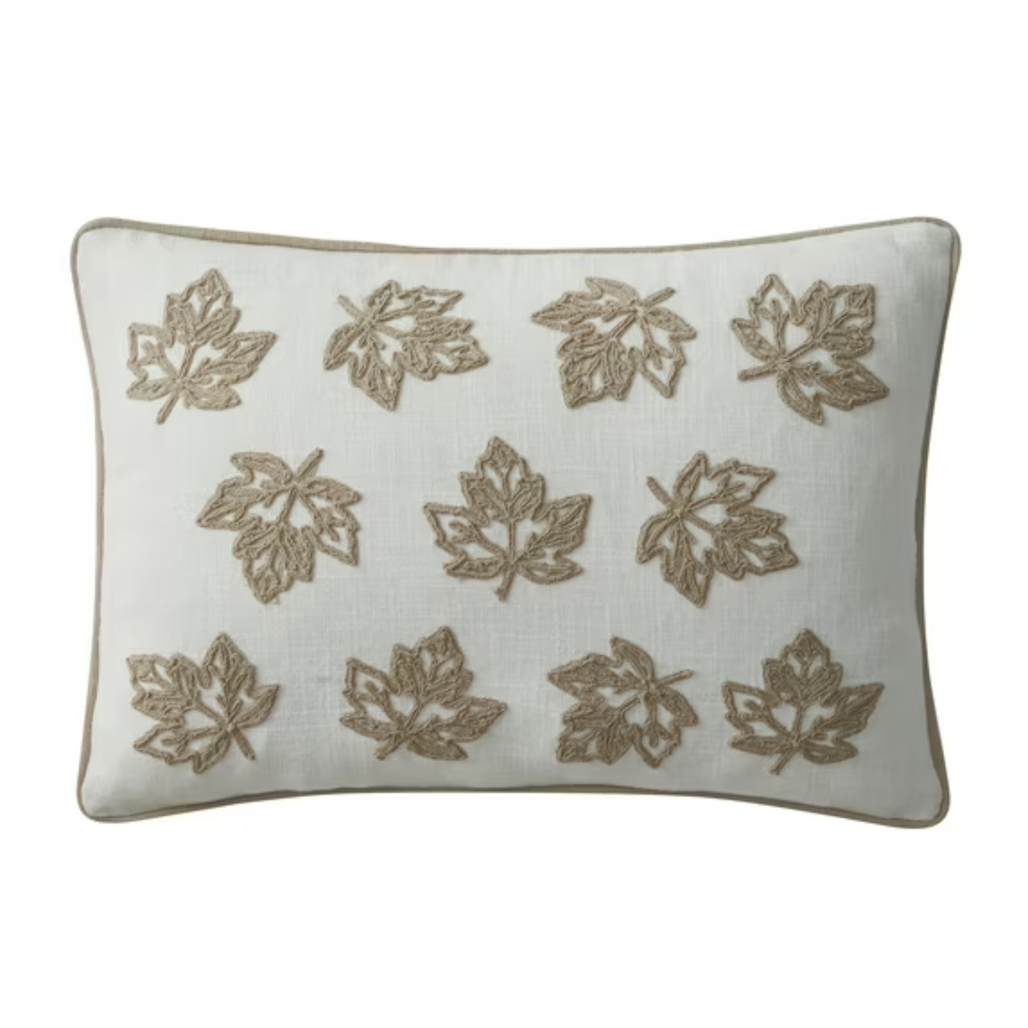 A pillow with leaves on it