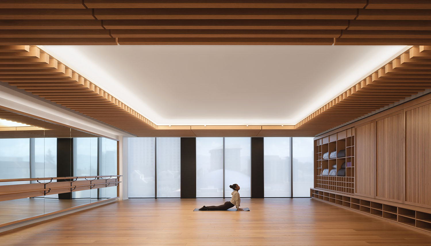A person sitting on the floor in a room