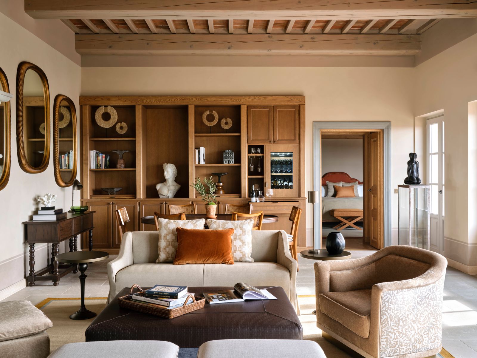Image can include residential cultural book -booking couch furniture person desk bed system and architecture