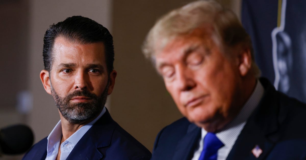Don Jr. Posts Bizarre's picture of Papa, who throws sex toys from the white house roof