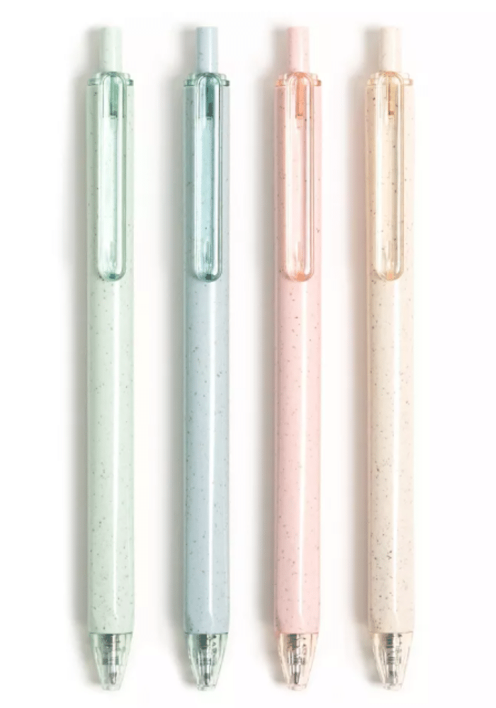 Four pastel-colored pens (mint green, light blue, pink and cream) with suitable translucent clips that are vertically arranged on a white background-perfect supplies for your back to school.