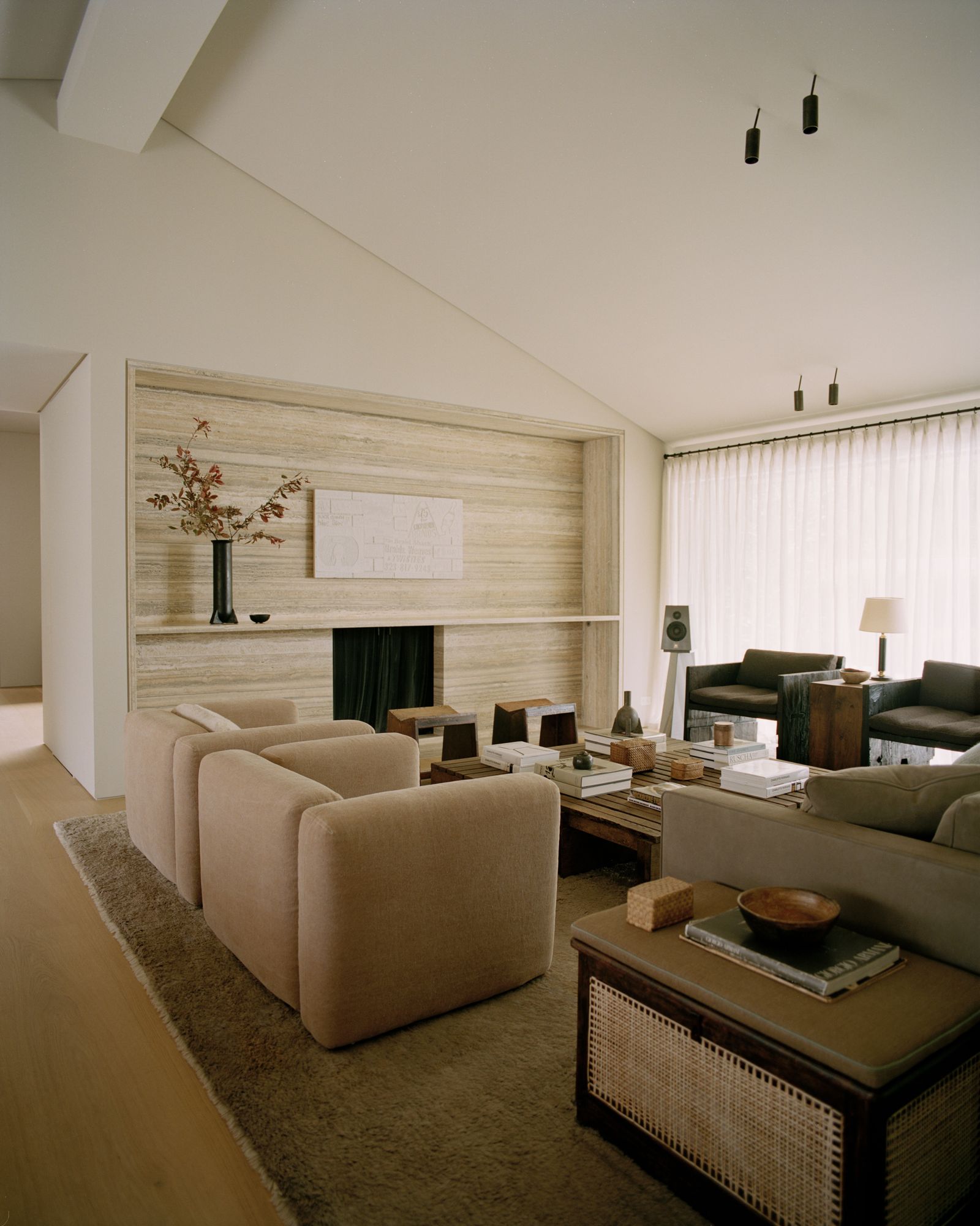 Image can contain residential culture in the interior designer in the interior design book Booking coffee table furniture table and architecture