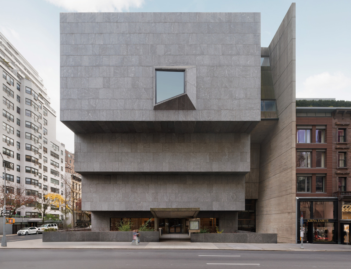 Museum buildings with a modern architectural design with a unique geometric facade in an urban environment.