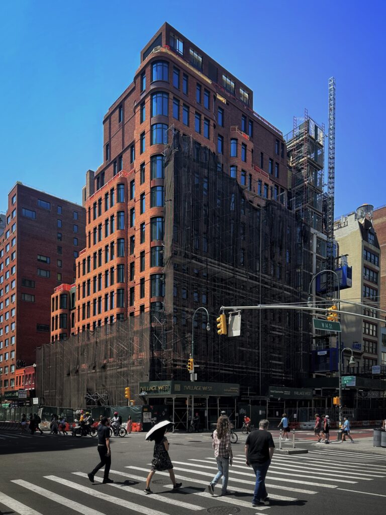 The brick facade of the village West is approaching the completion in the 525 Sechth Avenue in West Village, Manhattan