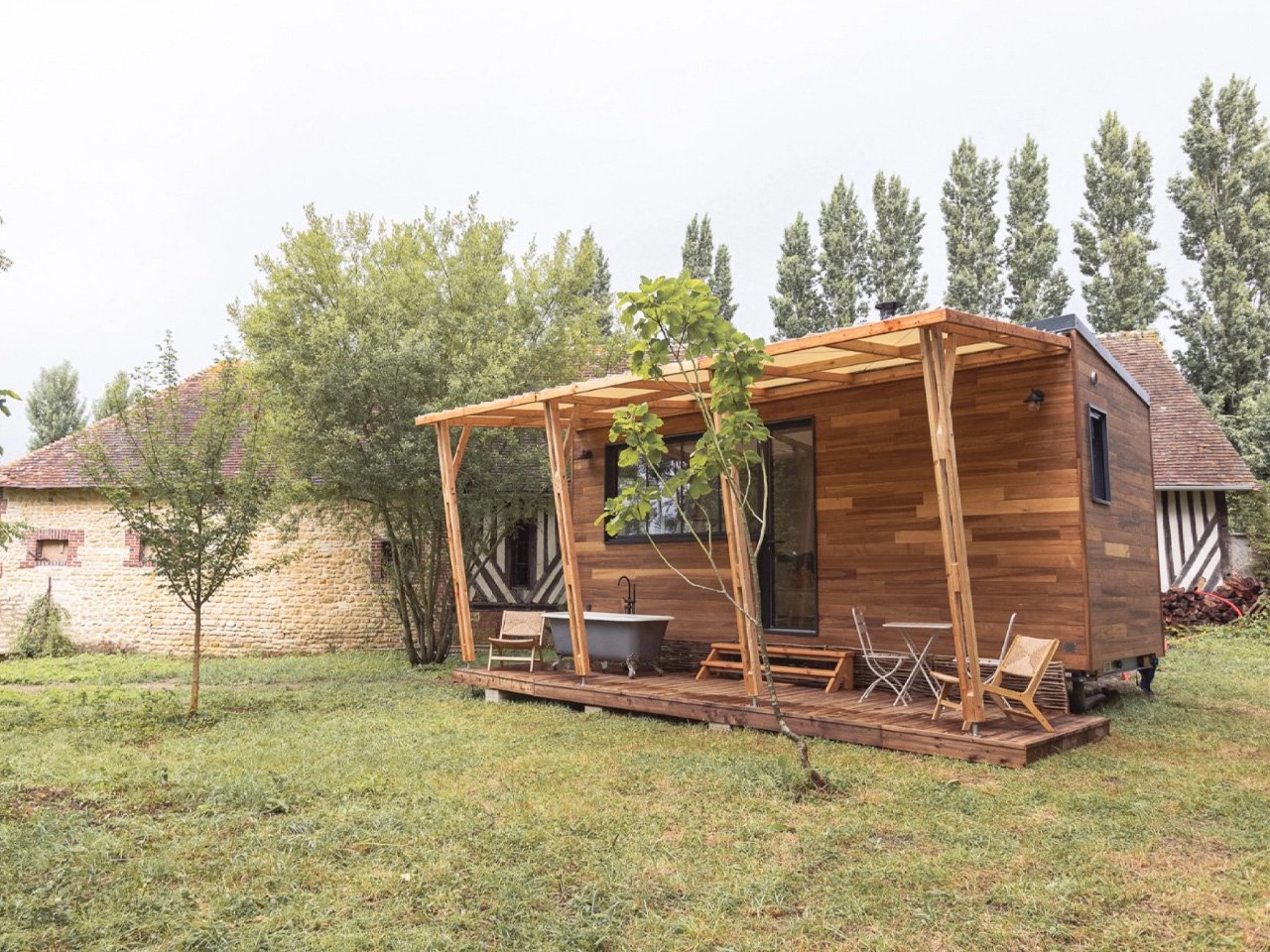 With innovative and inviting tiny house you can enjoy an outdoor pool in the French landscape
