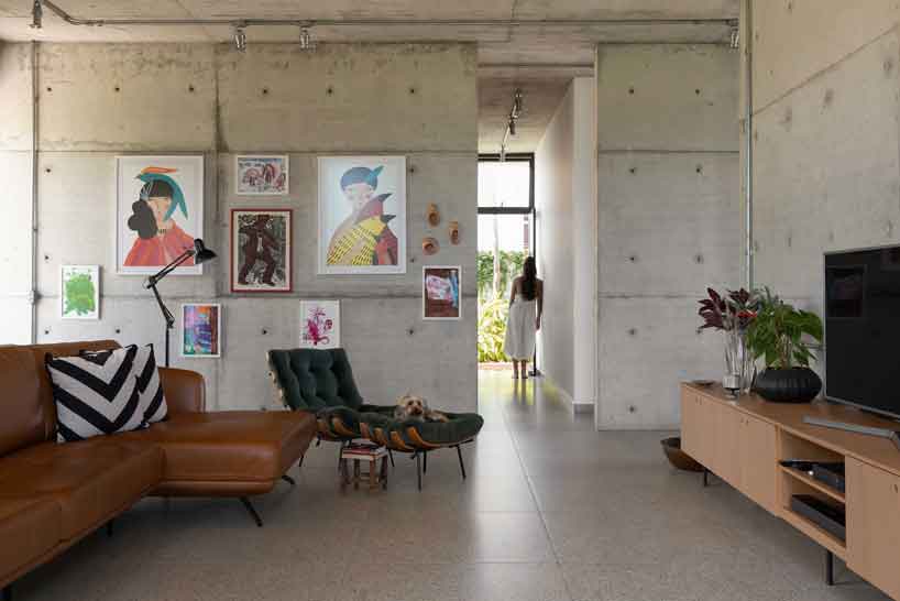 Perforated brick facade punctures Fernanda Padulas concrete house in Brazil